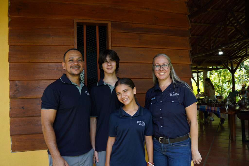 Ismael, Lindy and children smiling together at the cacao farm