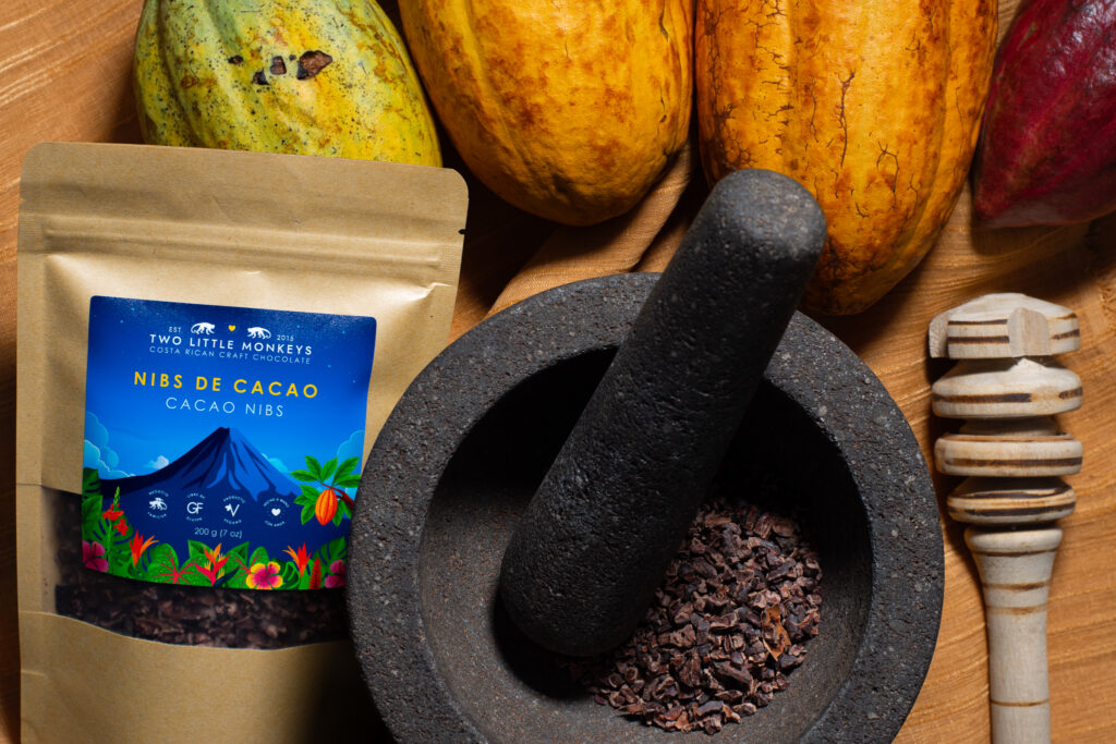 Handcrafted Two Little Monkeys chocolate bars, cacao pods and nibs