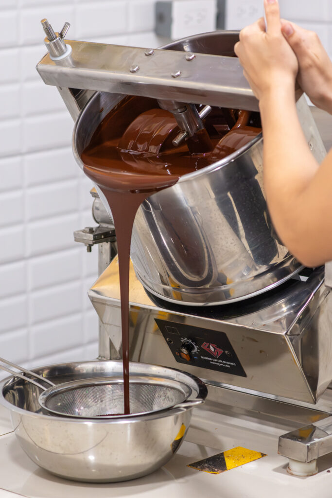 Chocolate tempering machine in the factory