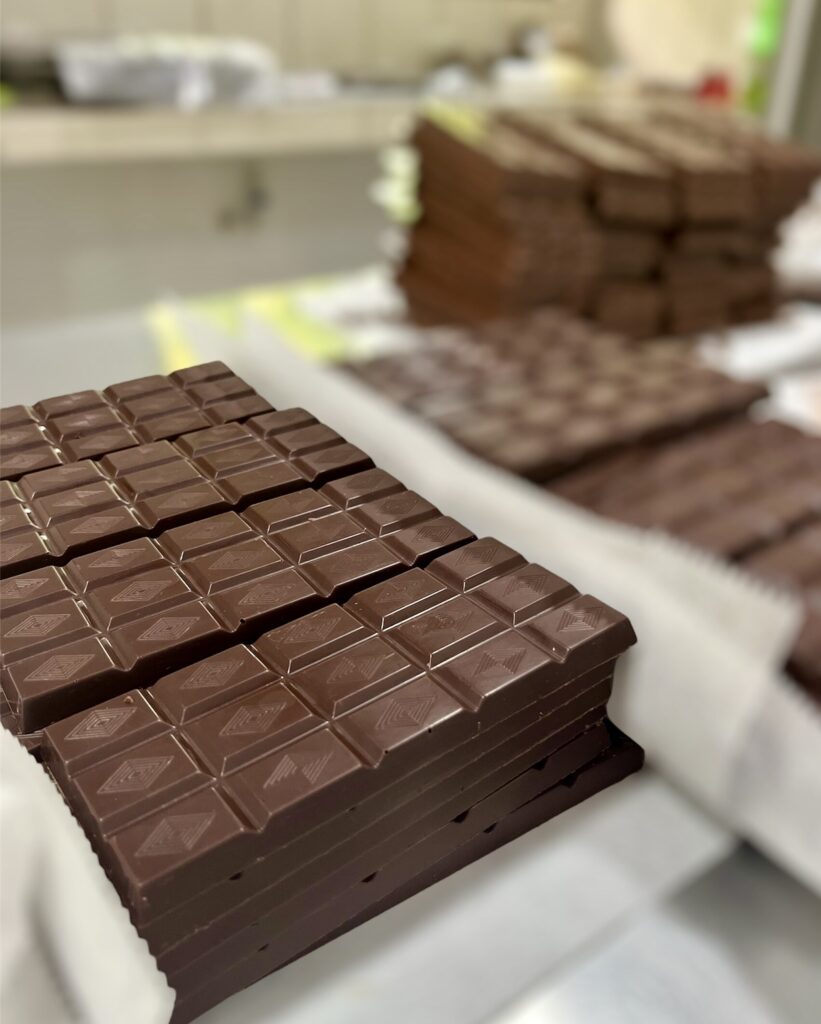 Stacks of freshly made dark chocolate bars